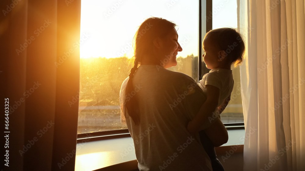 Multi-generational family embracing outdoors